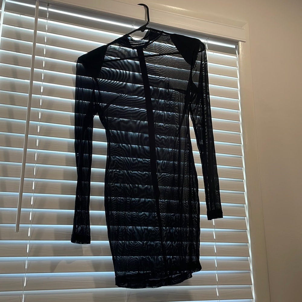 Black sheer dress with body suit never been worn